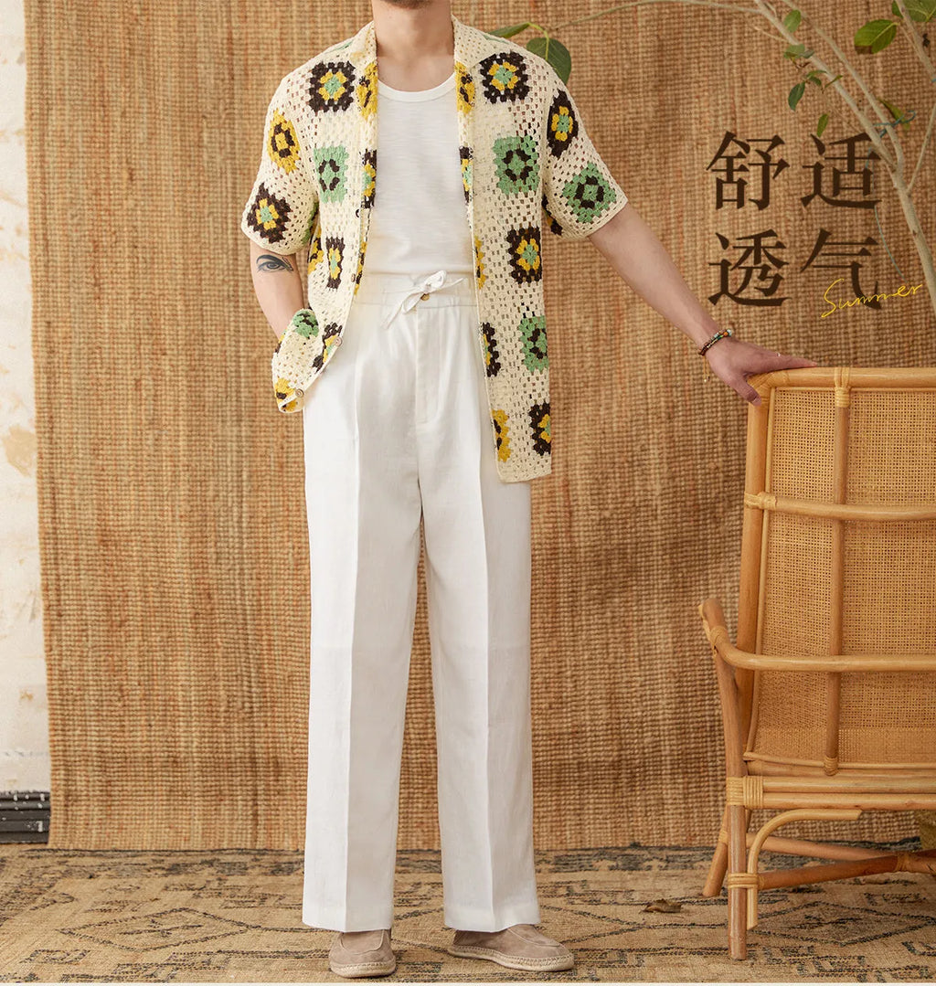 Linen high-waisted trousers with elasticated waist and lace trim in a straight-leg, loose fit.