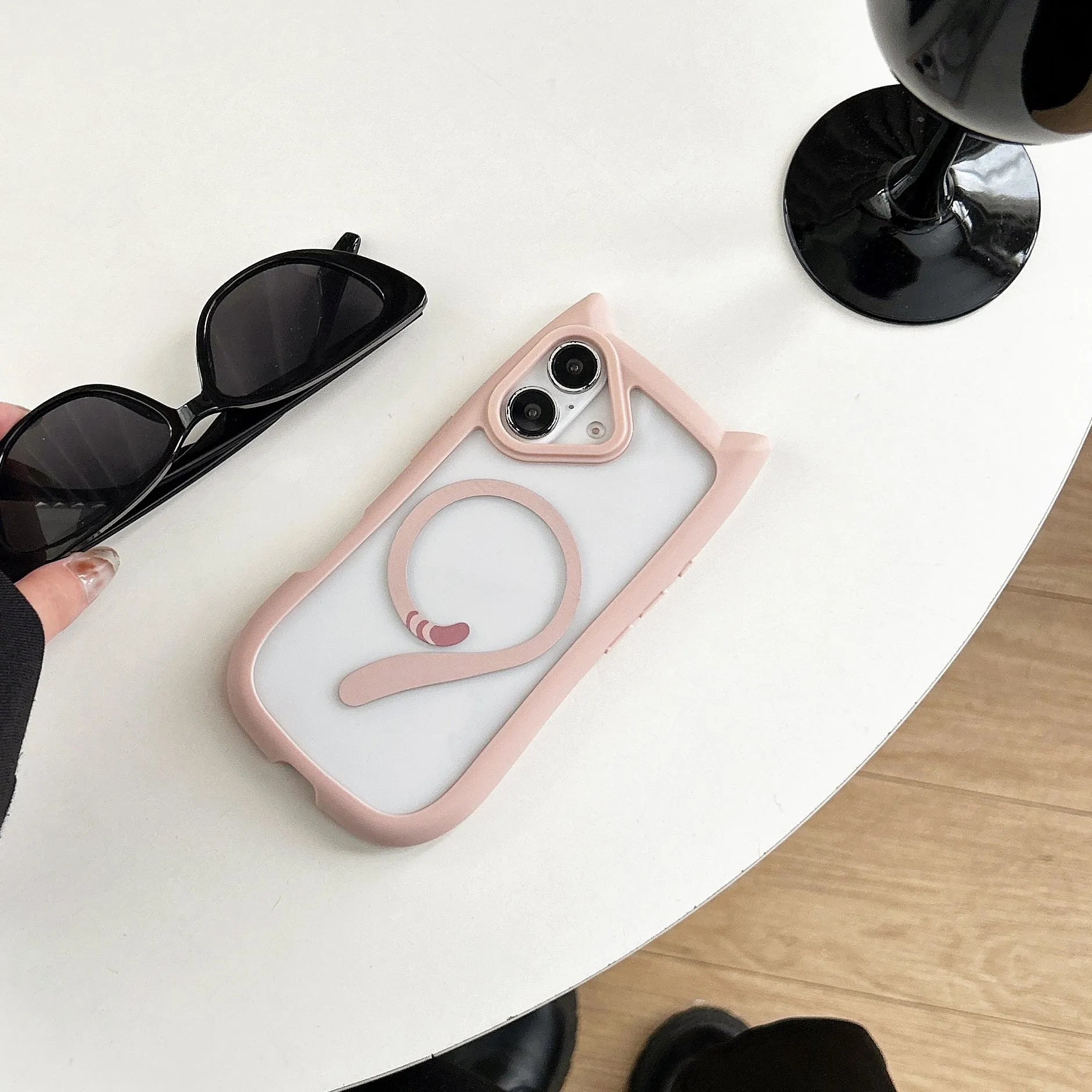 Transparent acrylic TPU phone case for iPhone 17 series in black colour, showing magnetic ring feature.