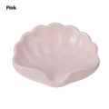 Plastic shell-shaped soap dish in pearl white or pink for bathroom use