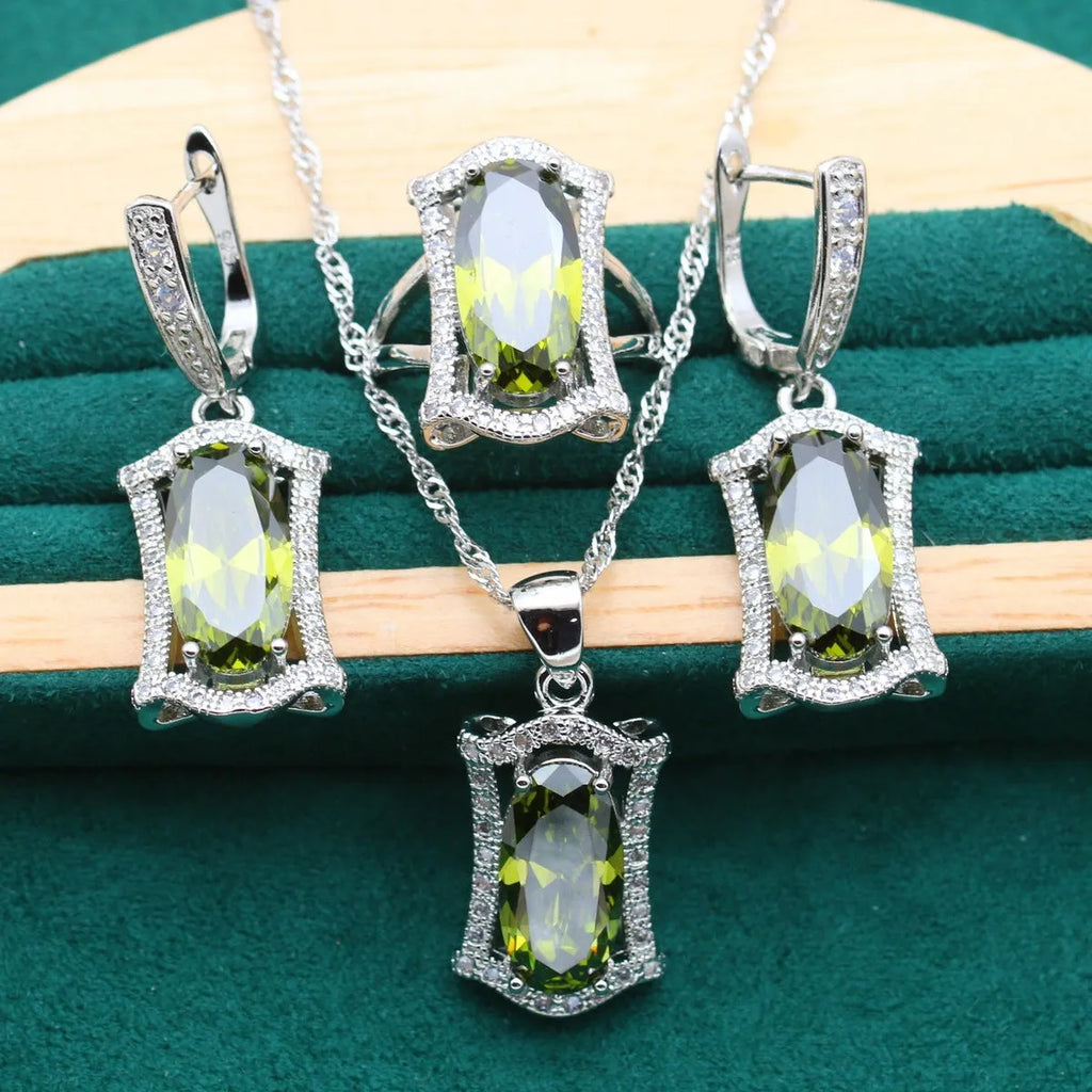 Complete zircon jewellery set with snake bone chain necklace, matching earrings, ring and bracelet in yellow or olive colour