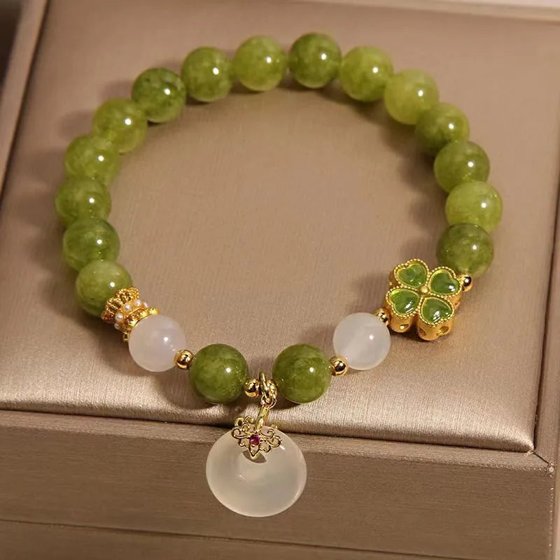Women's green tourmaline bracelet with a four-leaf clover safety buckle in New Chinese style.