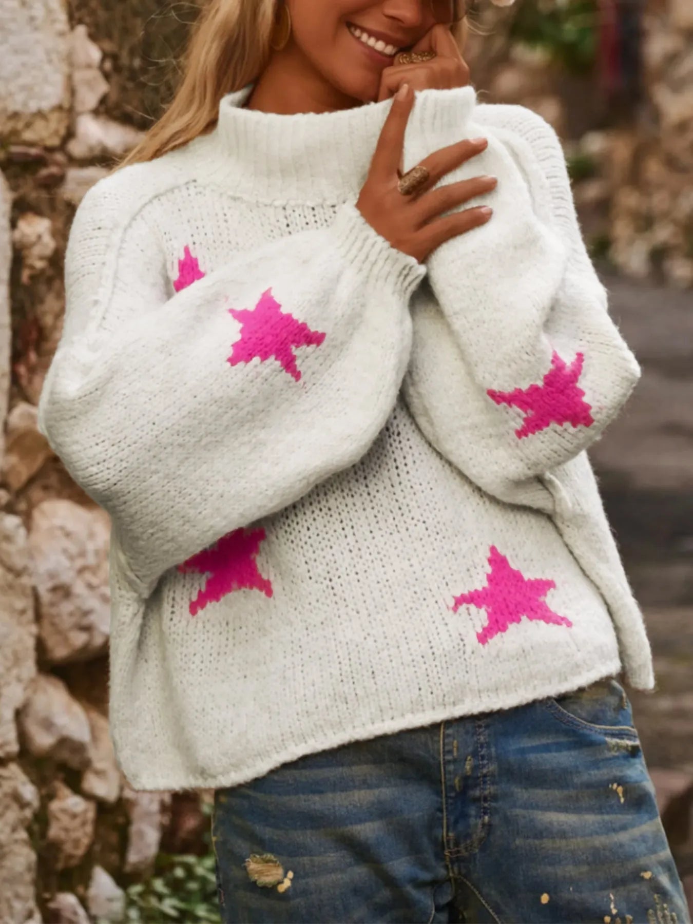 Women's white turtleneck pullover with five-pointed star pattern and loose fit design