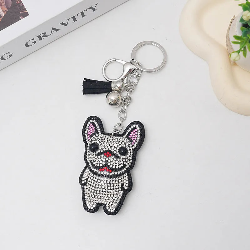Cartoon dog design rhinestone keychain pendant on alloy base in caramel colour