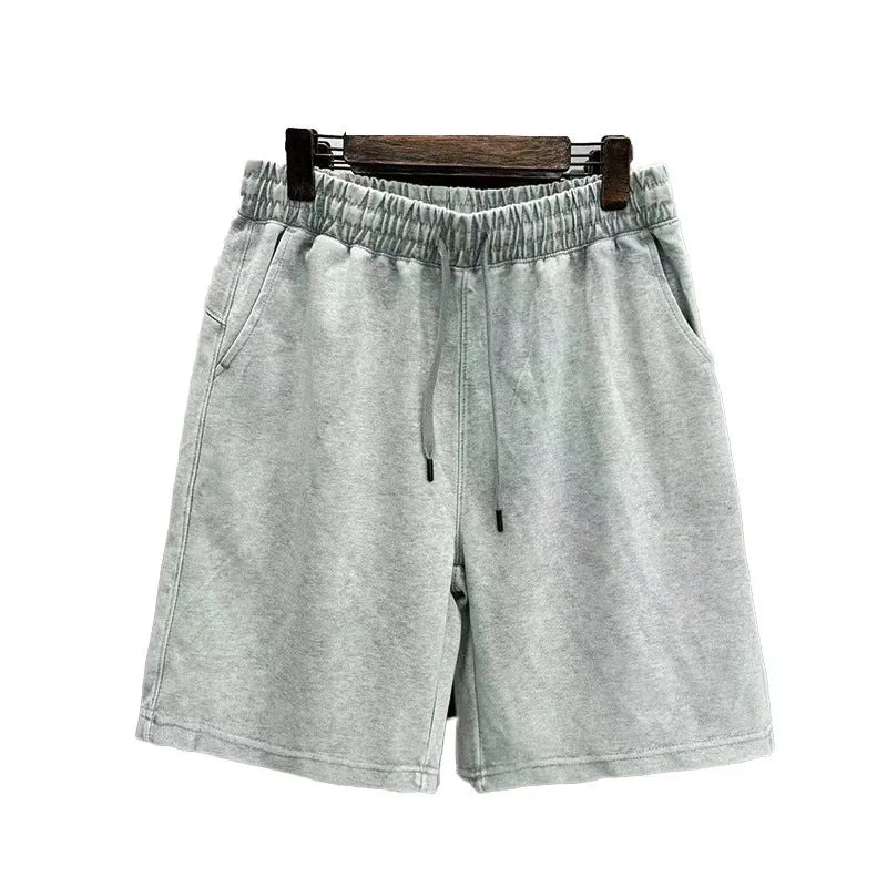 Men's cotton distressed casual shorts in loose straight-leg fit showing colour options