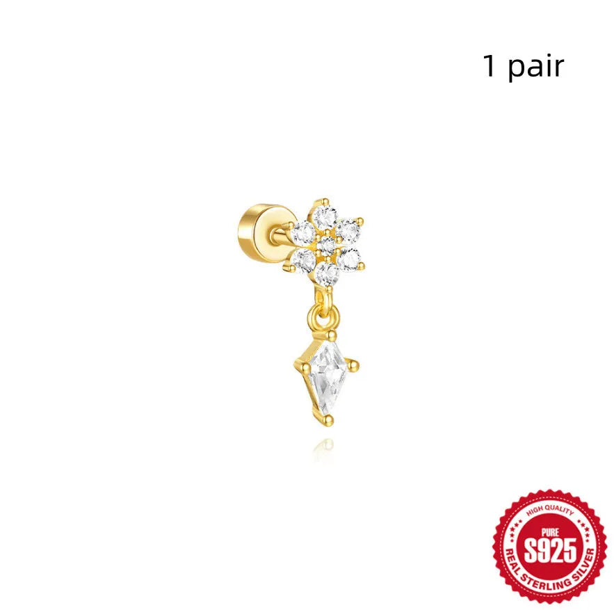 A pair of geometric S925 sterling silver ear bone studs with a flat column thread post, shown in a gold tone finish.