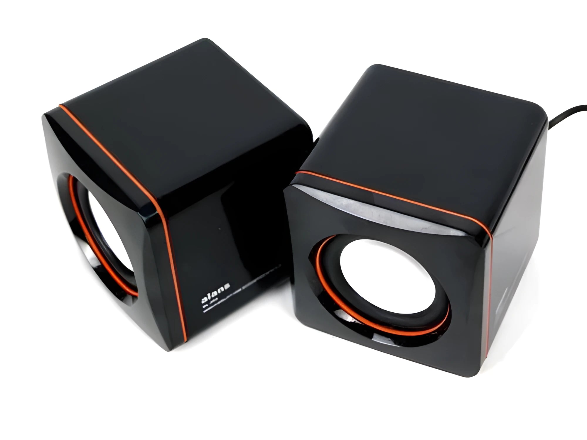 Small square black USB-powered 2.0 computer speaker on a desktop.