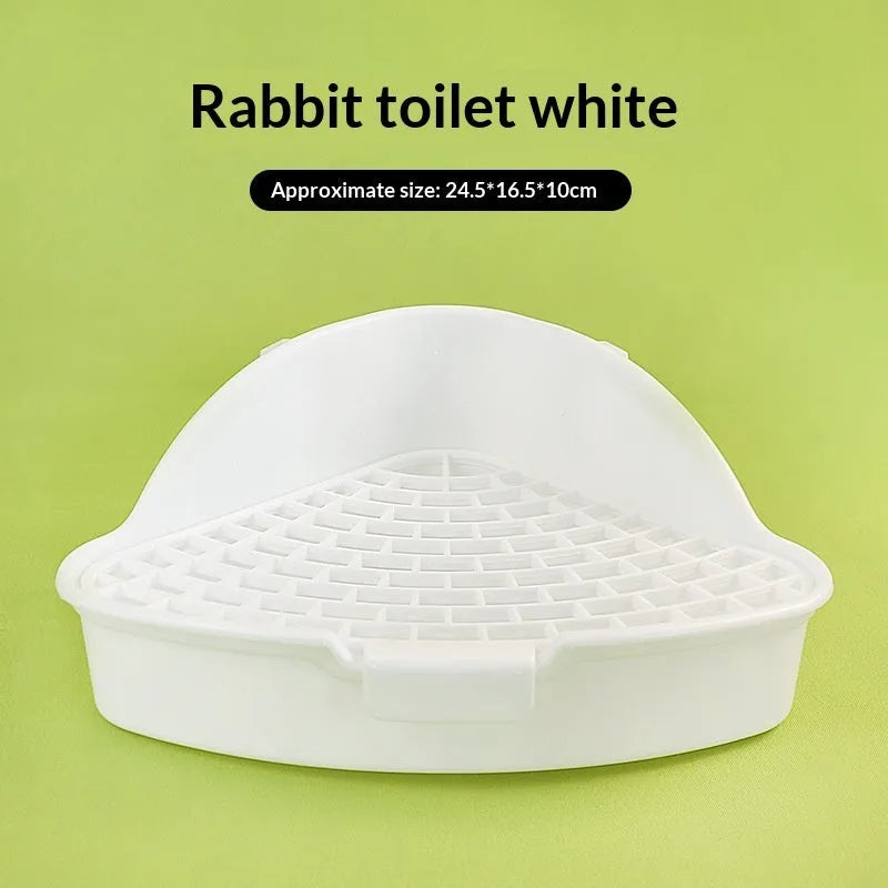Triangular plastic pet bunny toilet potty in white, yellow, pink, or blue for small animal corner use