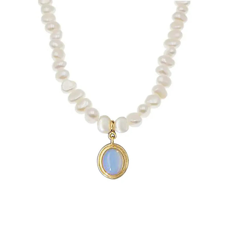 Silver geometric necklace with round medal and pearl pendant on adjustable chain