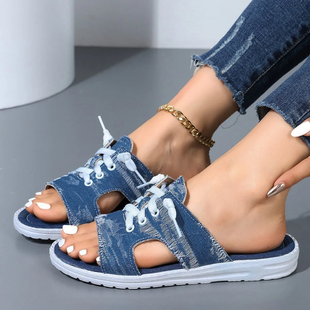 Blue Roman style women's canvas slippers with cloth upper and flat rubber sole