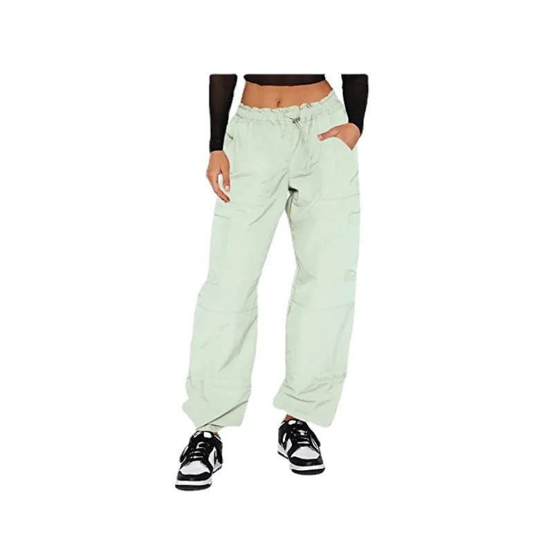 Multi-bag straight cargo casual pants in a loose fit, shown in a light blue colour with visible cargo pockets.