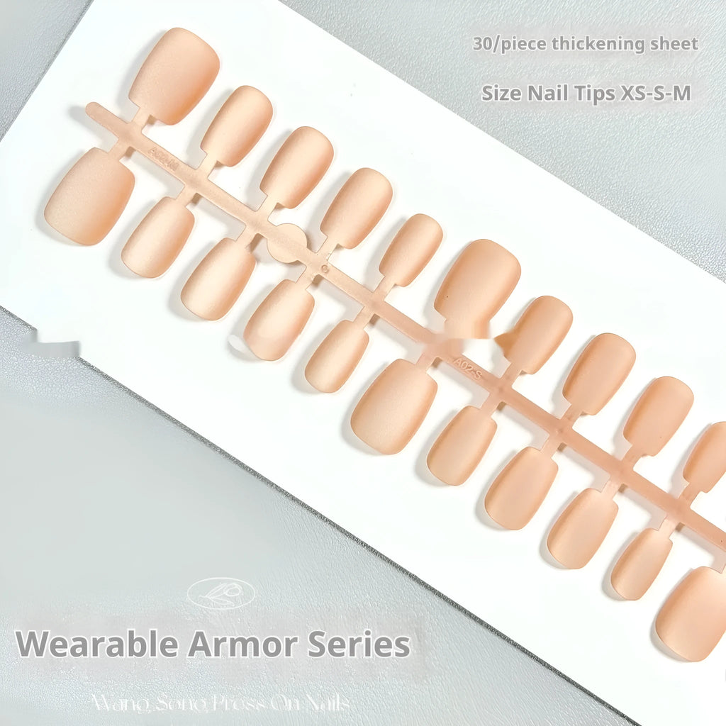 Set of velvet frosted false nails in short ladder shapes showing Cat's Eye, Aurora, and solid colour designs.