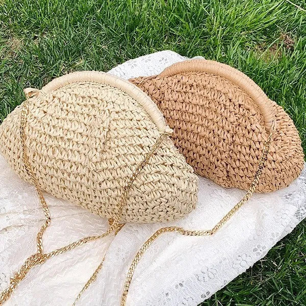 Women's shell-shaped straw shoulder bag with chain strap in khaki colour showing zippered internal pocket