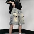 Blue retro-style women's denim shorts with wide leg, loose fit, and tattered detailing on a neutral background.
