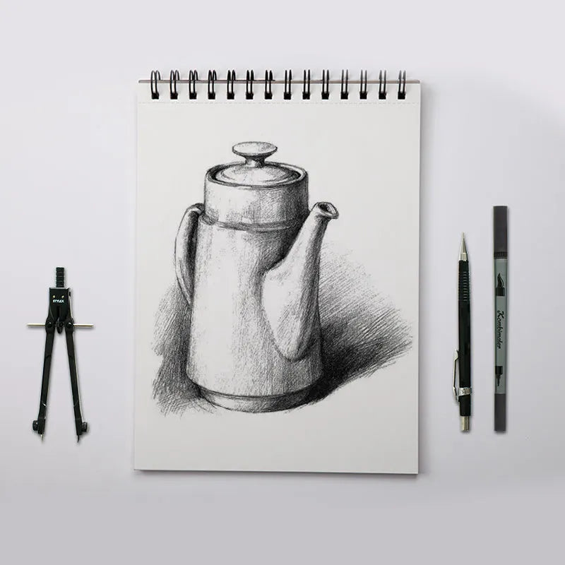 A4 sketchbook with spiral coil binding and white paper, shown open.