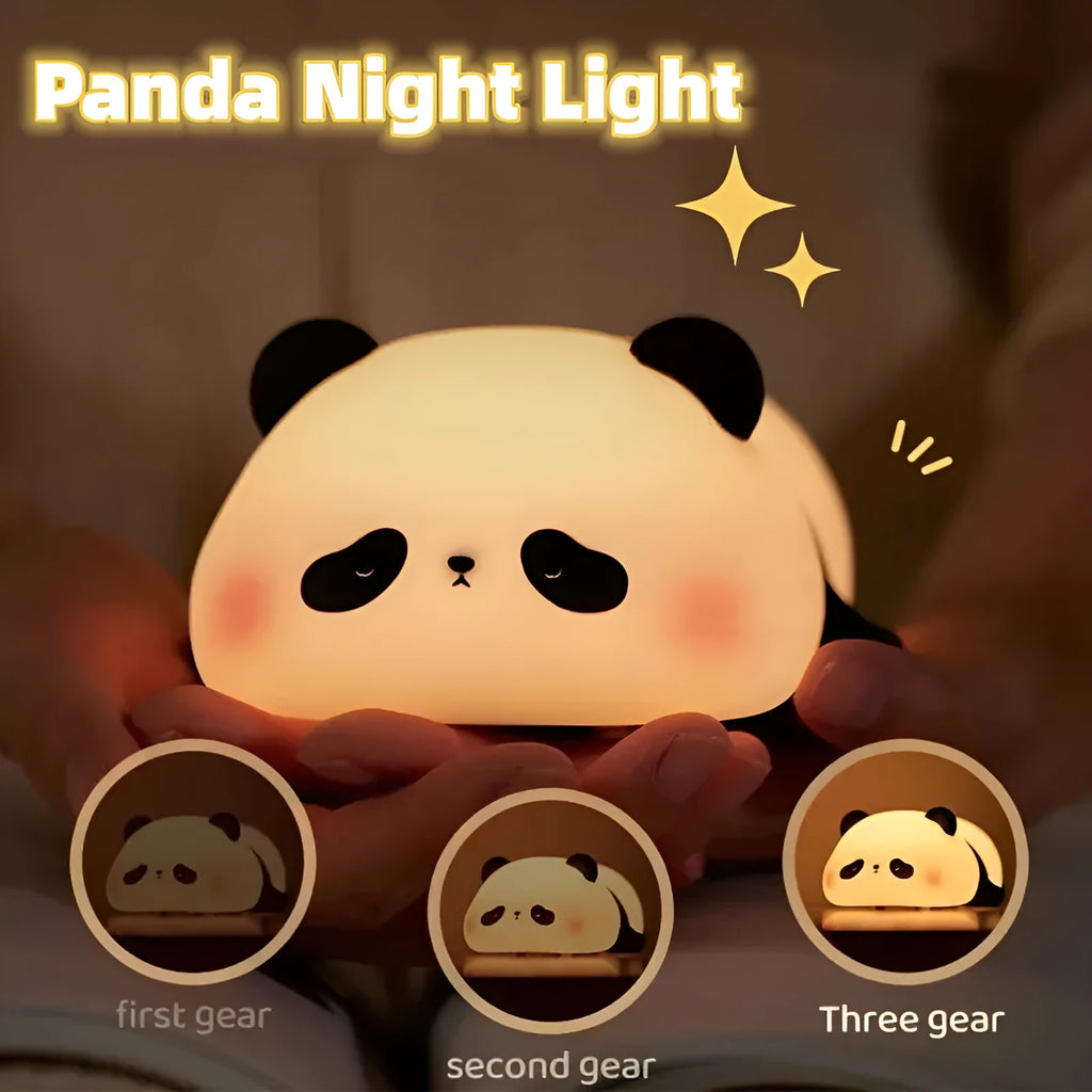 Cartoon panda-shaped night light with soft white glow on dark surface