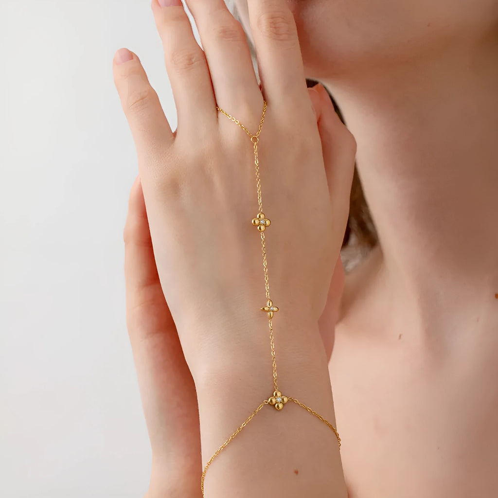 Gold colour stainless steel bracelet with flower and eight-pointed star geometric design for women