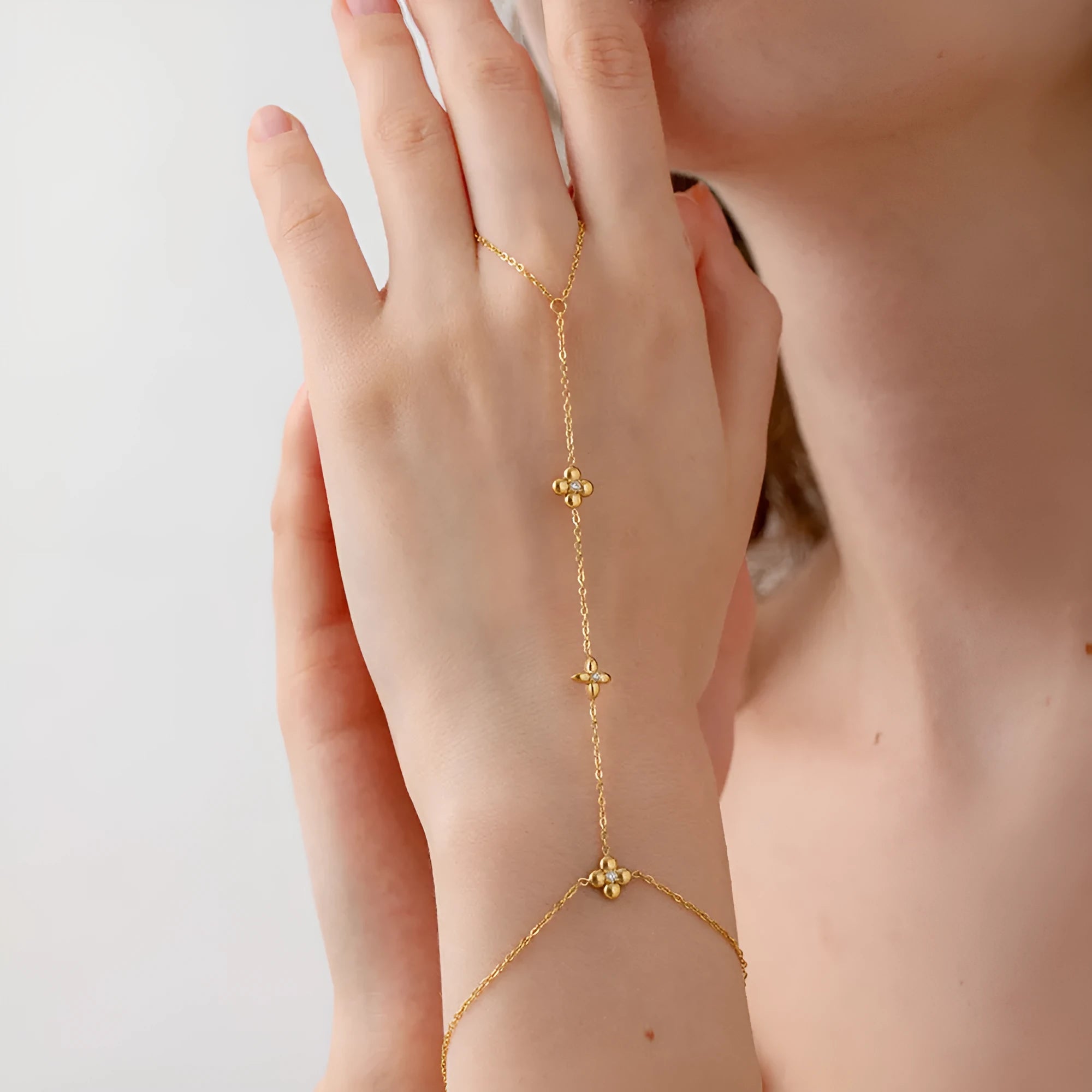 Gold colour stainless steel bracelet with flower and eight-pointed star geometric design for women