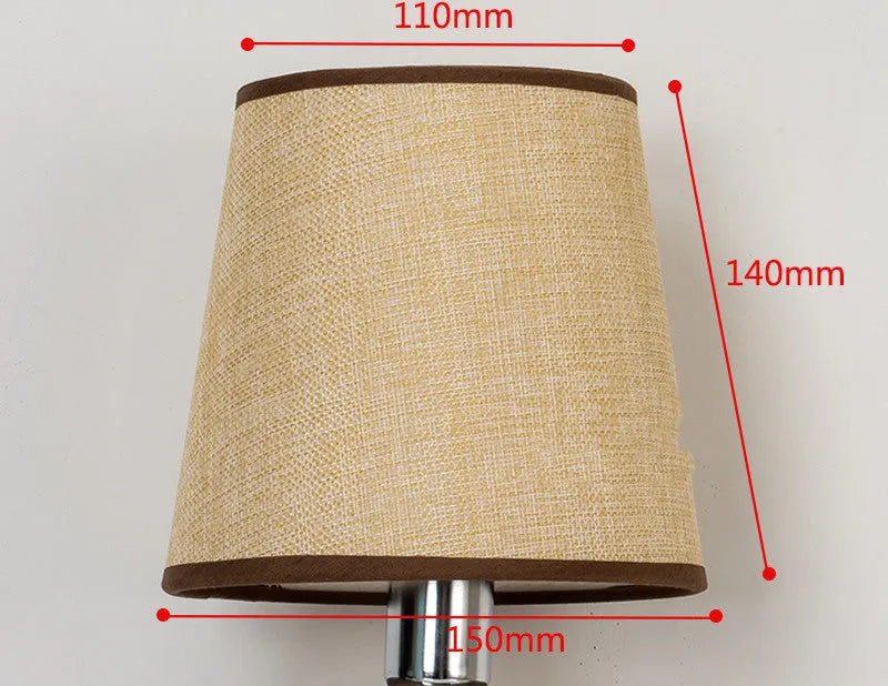 Modern minimalist white fabric lampshade on a wooden table next to other colour options.