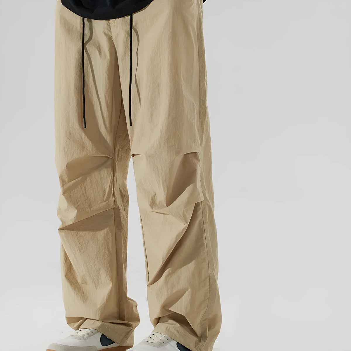 Men's straight-leg casual trousers in thin ice silk nylon fabric showing loose fit and colour options