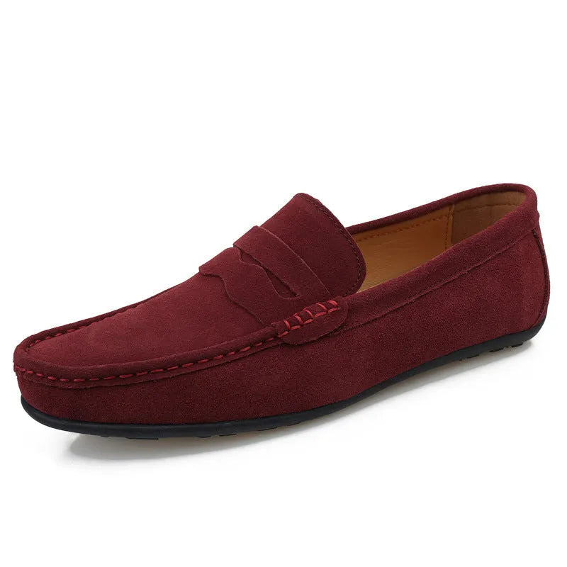 Men's brown suede slip-on loafers with round toe and flat rubber sole
