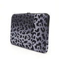 Leopard print laptop sleeve for 13-inch and 15.6-inch computers with waterproof anti-shock protection.