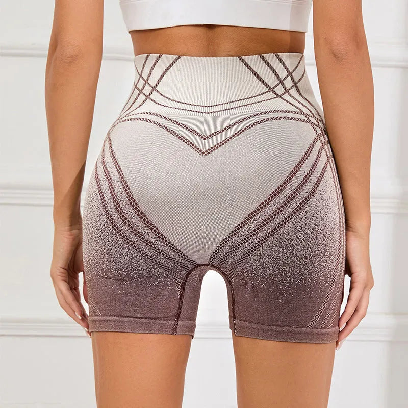 Women's black gradient high-waisted fitness shorts for yoga and running.