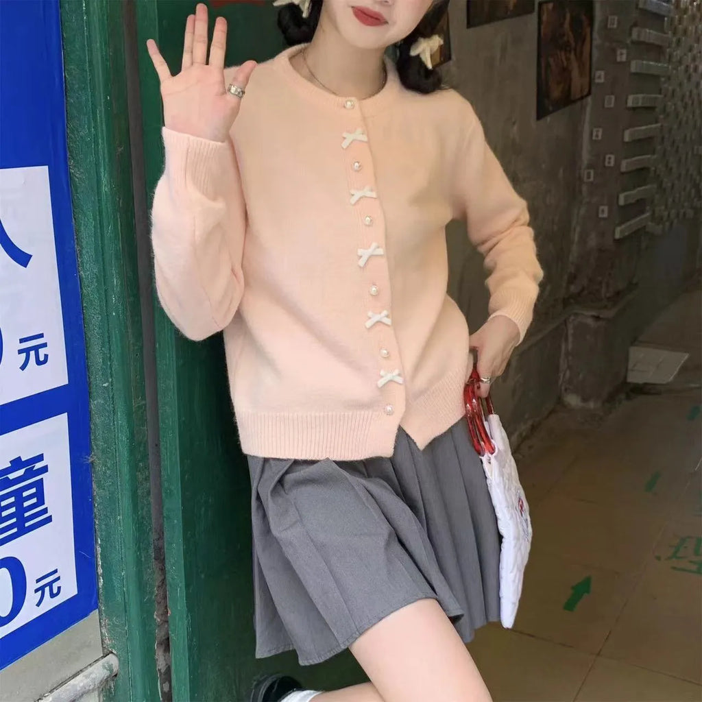 Women's bow detail pearl button cashmere blend cardigan sweater in regular fit