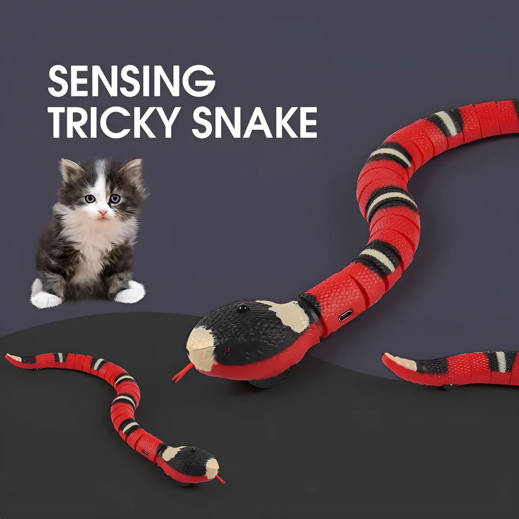 Electronic snake cat toy with segmented plastic body showing S-type crawling motion on floor