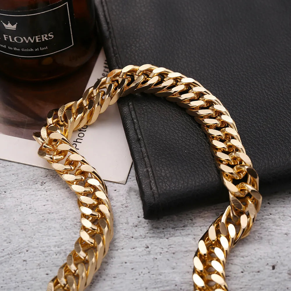 Women's gold tone thick chain necklace showing alloy construction with electroplated finish