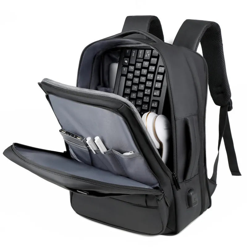 Black or grey waterproof Oxford cloth backpack for men with 20-35L capacity and curved shoulder strap.