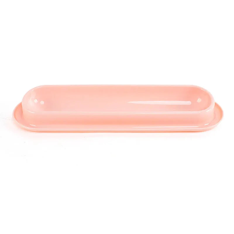 Four-compartment leakproof pet feeder bowl in pink colour for dogs and cats