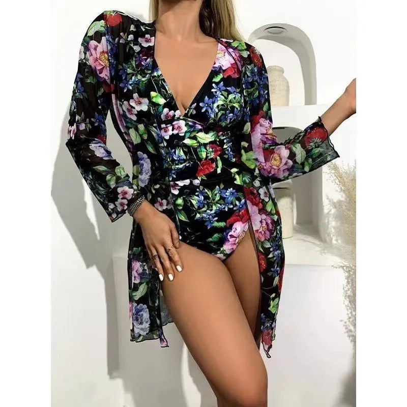 Women's floral print bikini three-piece swimsuit with a matching coat, shown in one of seven available colours.