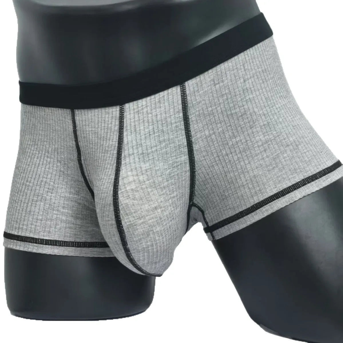 Men's solid colour boxer shorts in breathable fabric on a size chart showing L, XL, 2XL, and 3XL.