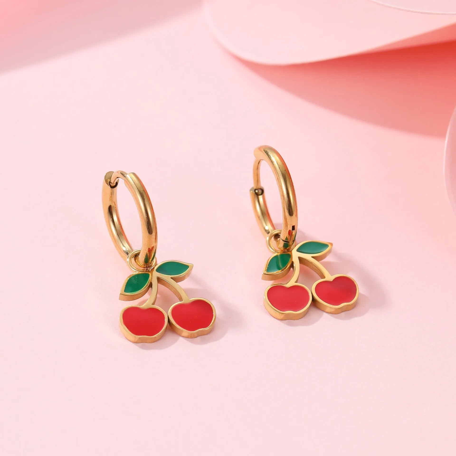 Cherry jewellery set with gold-plated necklace, bracelet, earrings, and ring on stainless steel chain