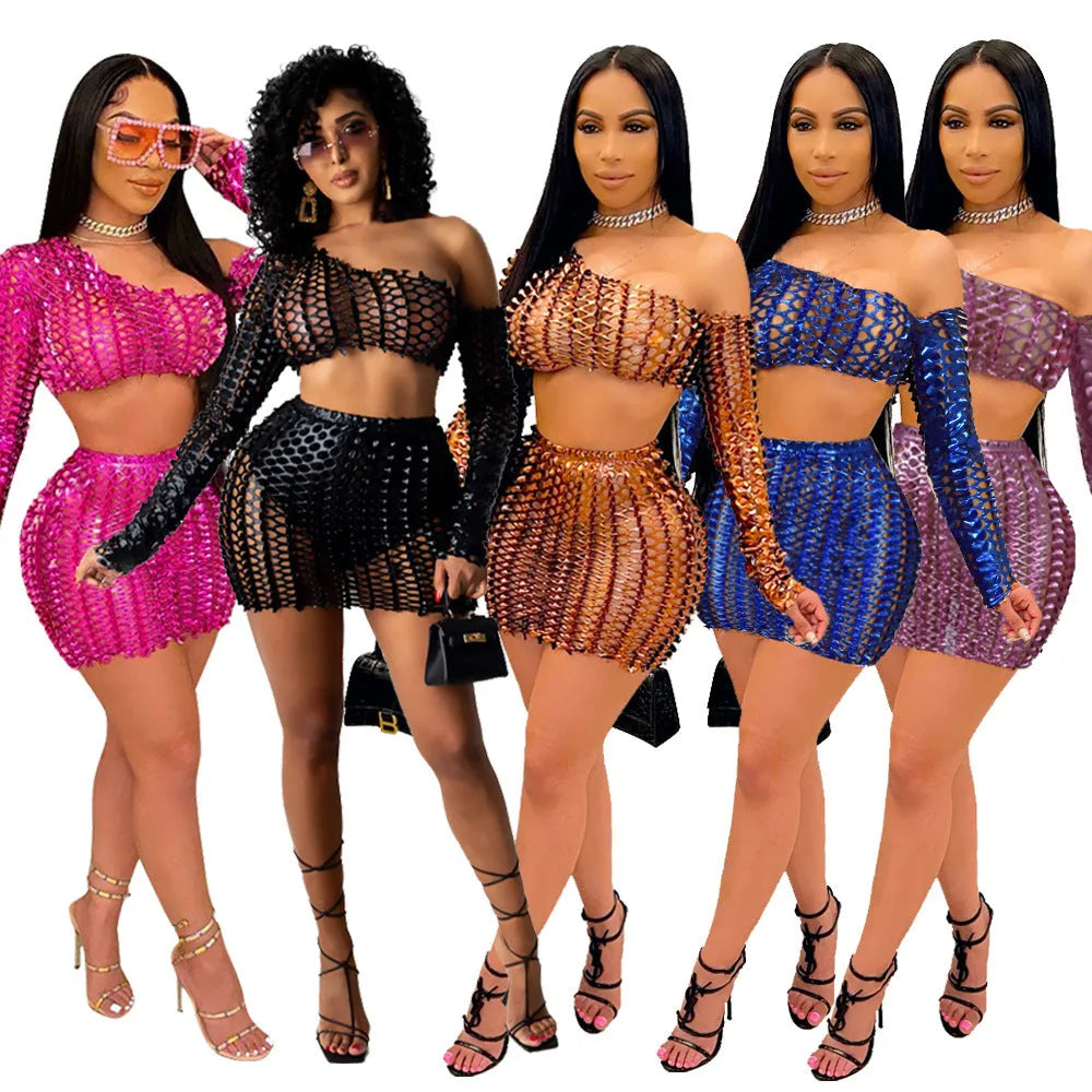 Women's black hollow-out net two-piece dress set with sleeveless top and short skirt.