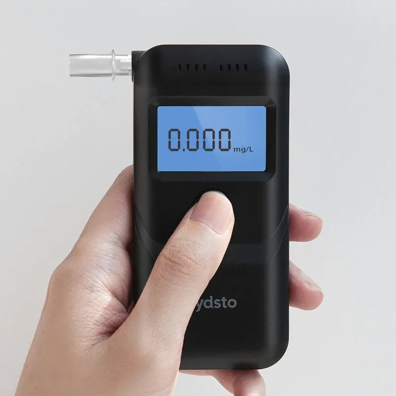 Black household alcohol breath tester for drinking check and drunk driving detection