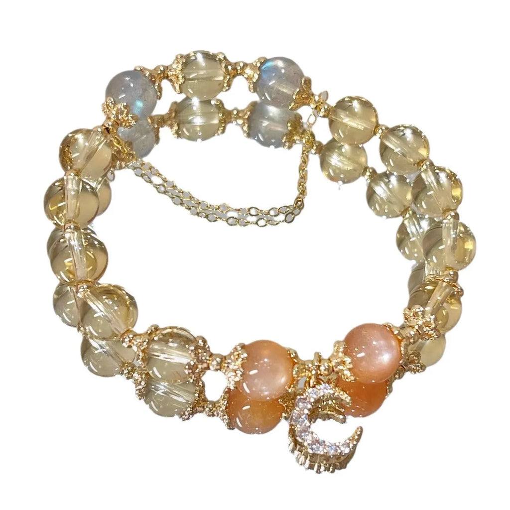 Chinese style women's crystal bracelet with 14K gilded moonstone, golden sun stone, and citrine colour diamond-shaped elements