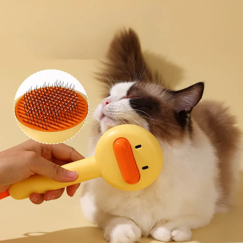 Small yellow duck comb brush for pet hair removal with open-section needle teeth