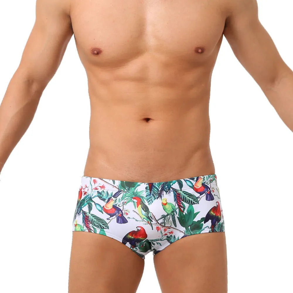 Men's swimming trunks with flower and bird print design in nylon fabric for beach and pool swimming