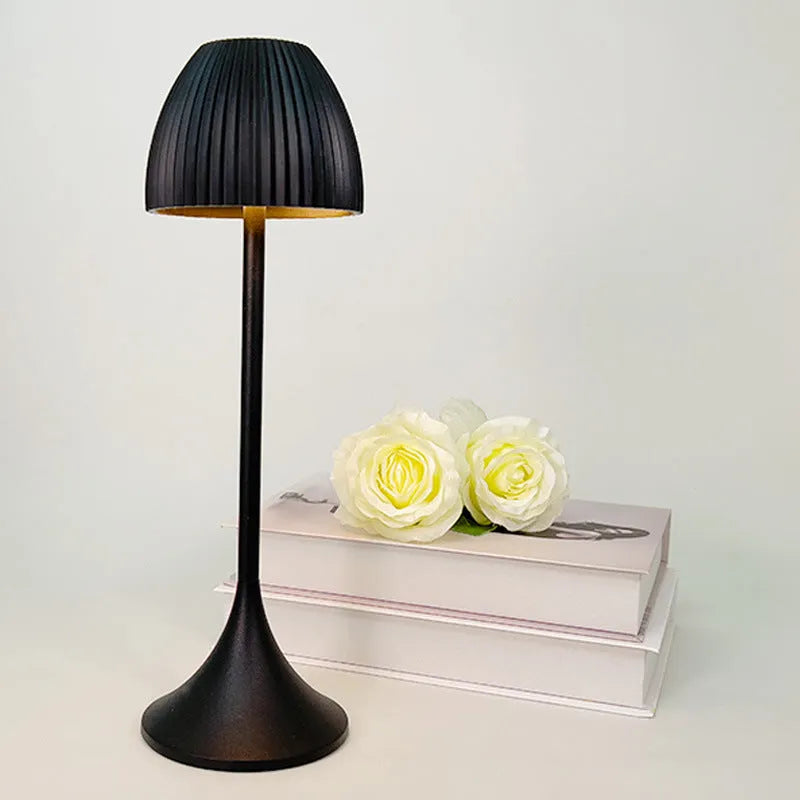 Modern dimmable USB rechargeable night lamp with thin round base in black or white colour.