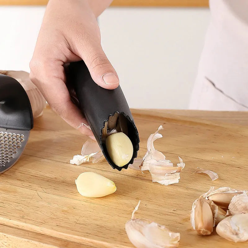 304 stainless steel garlic press in a choice of black, blue, green, or pink colours.