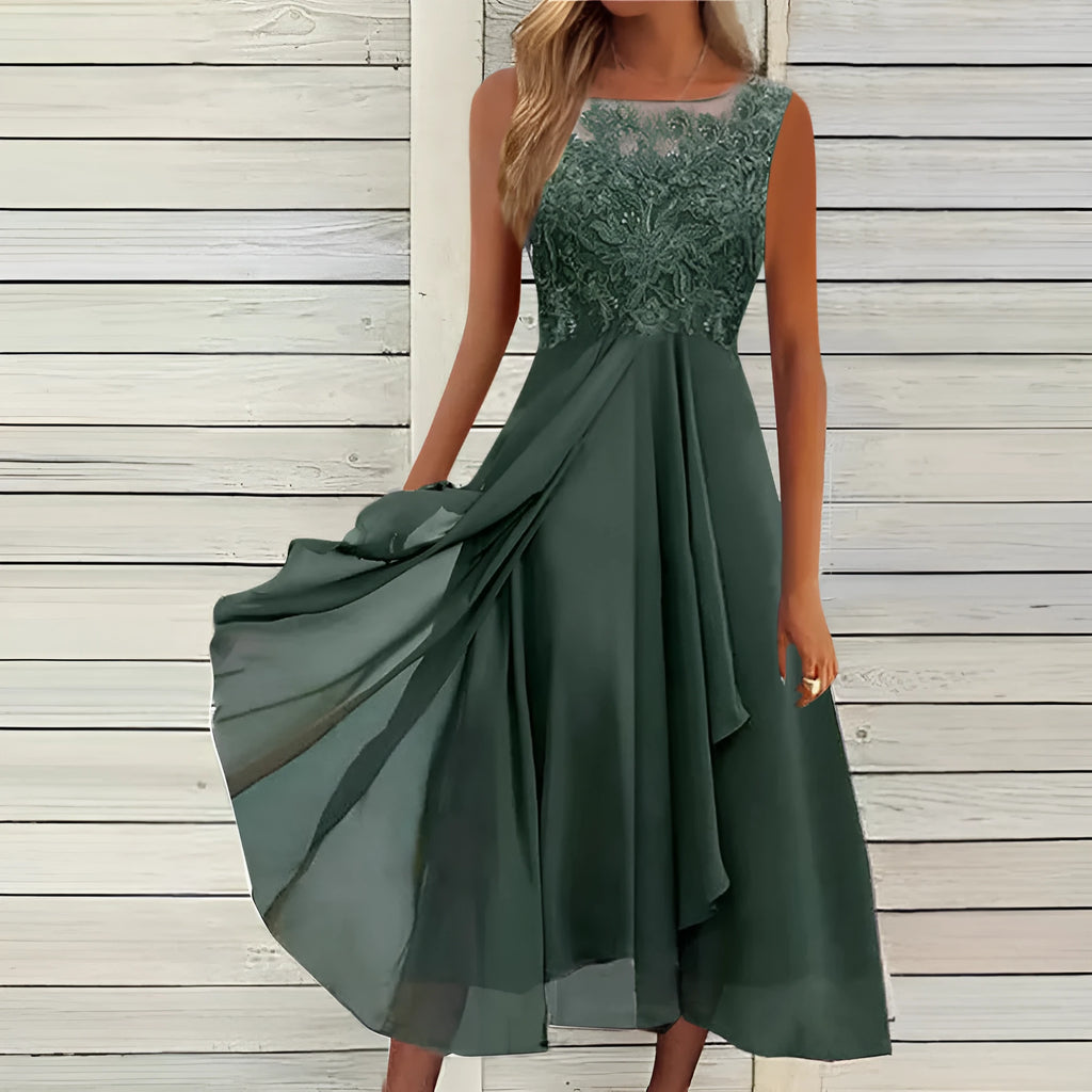 Women's sleeveless chiffon dress with hollow-out lace detail in green, shown on a hanger.