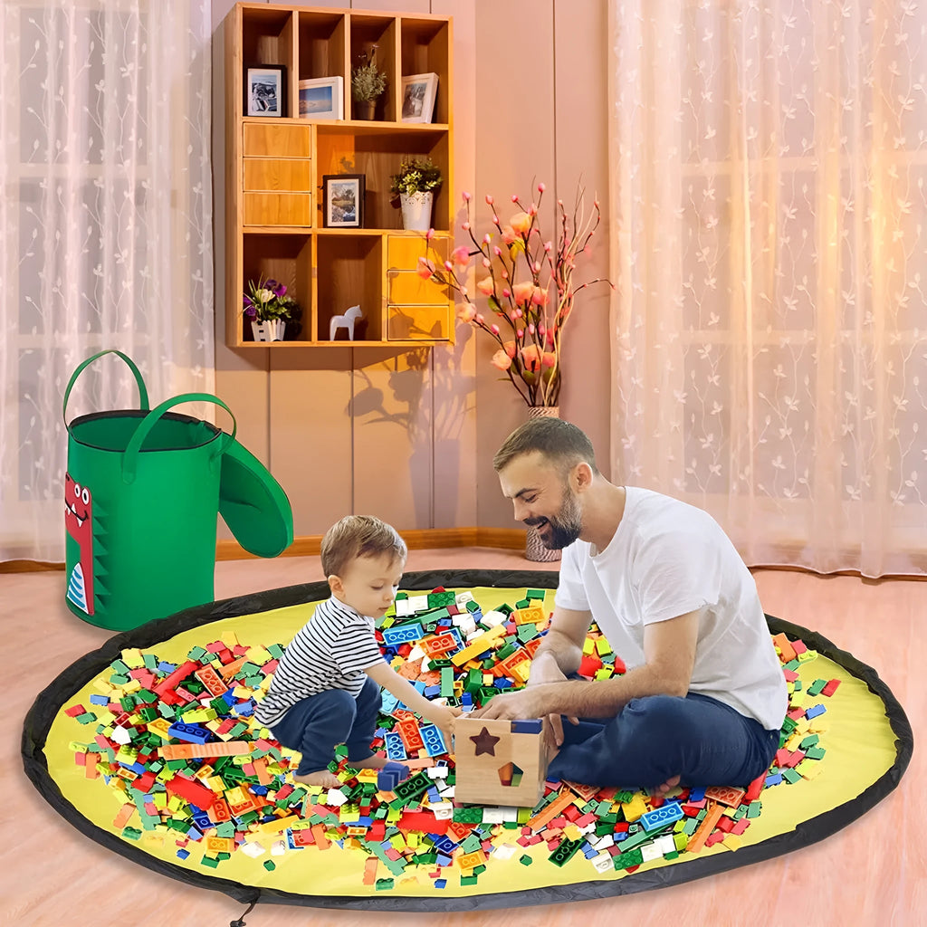 Green felt cube storage bag open showing toys inside, laying flat as play mat