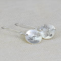 Silver retro women's earrings with bird and floral motifs on round glossy zinc alloy