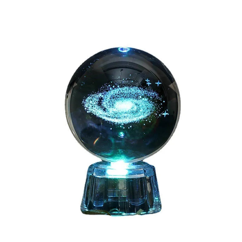 Transparent white crystal ball ornament with inner carving design measuring 6cm in diameter