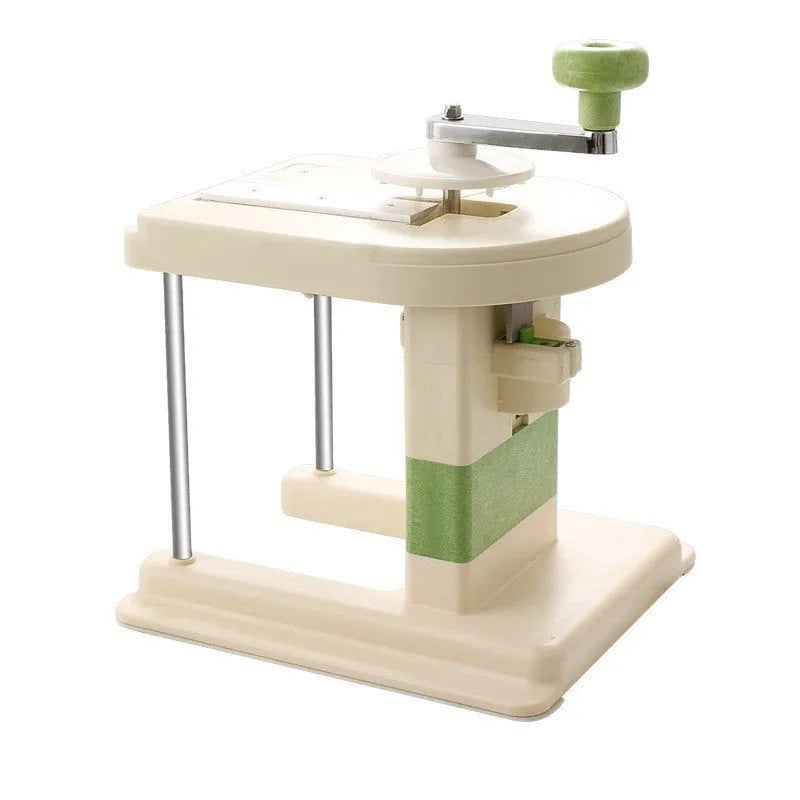 Beige stainless steel vegetable slicer chopper grater with spiralizer function on kitchen counter
