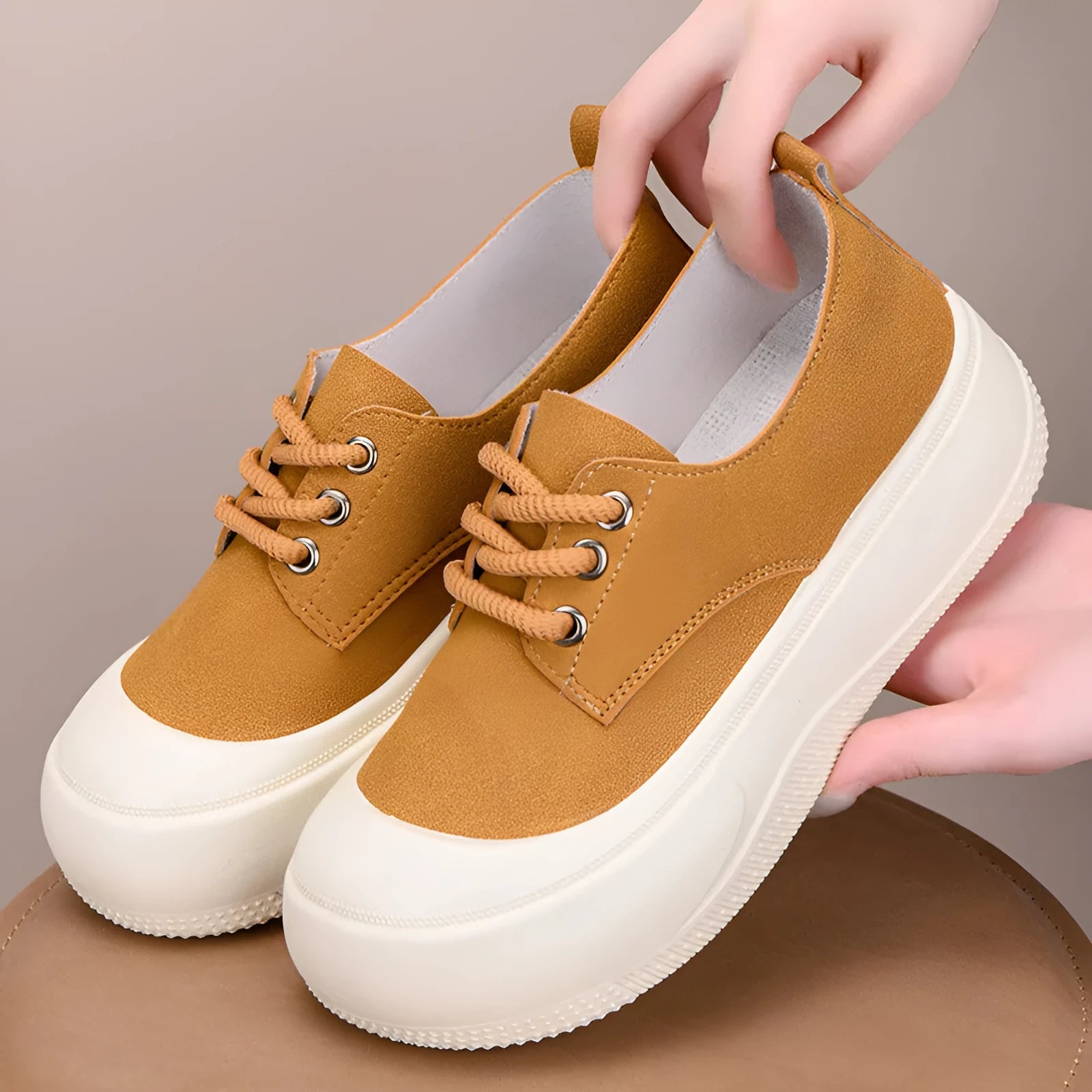 Women's suede platform loafers with 4cm height increase, round toe, and front lace-up design in beige, black, and camel.
