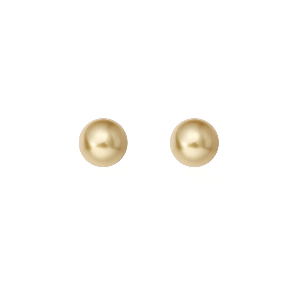 Close-up of retro-style geometric pearl stud earrings in silver, showing eight-awl star detail.