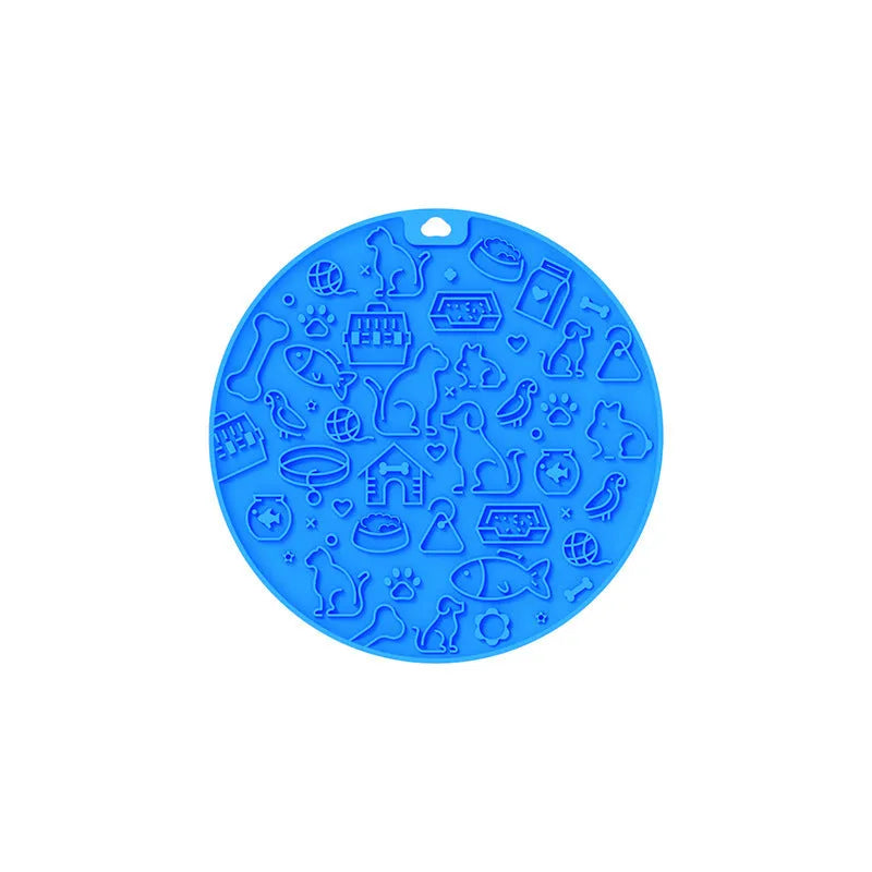 Round blue silicone pet licking mat with textured surface and a suction cup on the base.