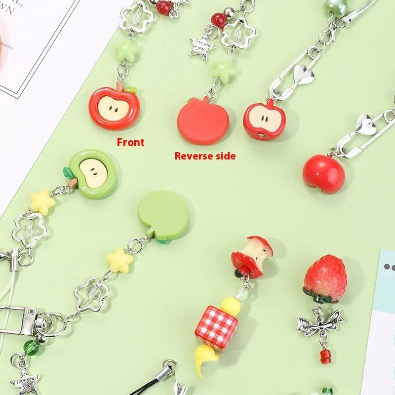 Cute fruit design plastic phone charm keychain on a white or silver rope.